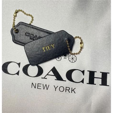 coach tag engraving.